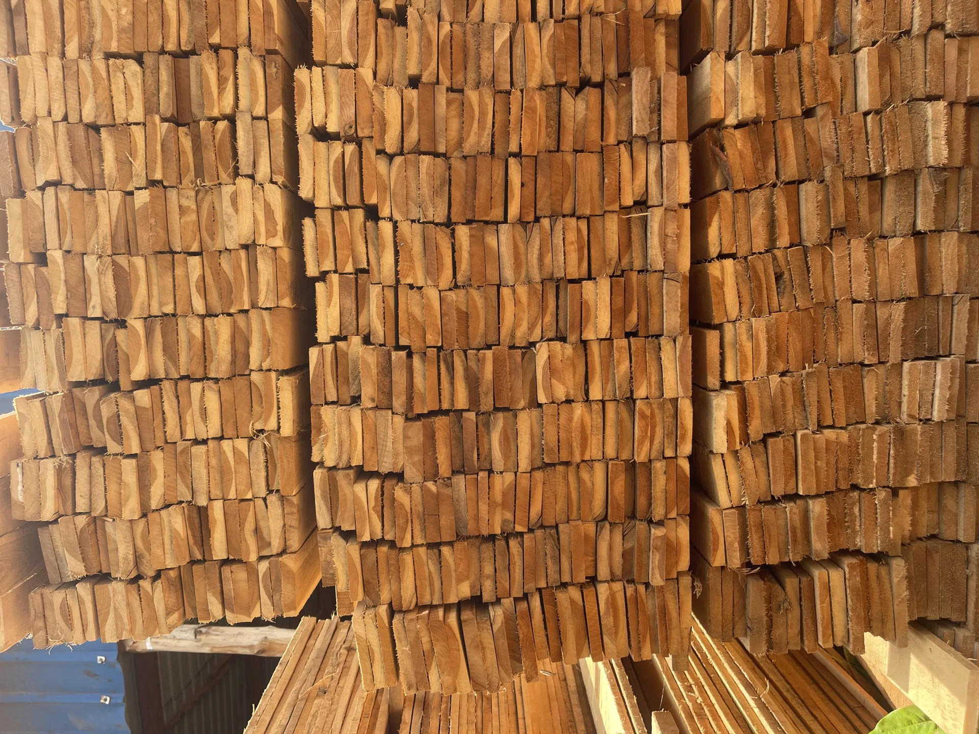 Stacked teak planks